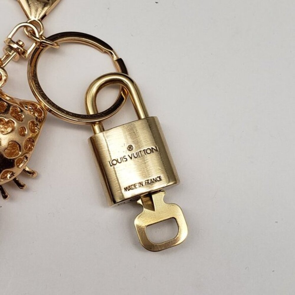 Louis Vuitton Gold Lock 🔒 Authentic LV Key + Unbranded Hello Kitty Bag Charm - Picture 5 of 7